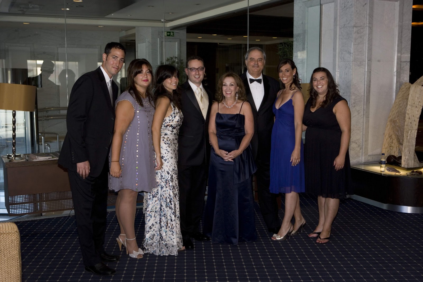 Morris with his family at a formal celebration